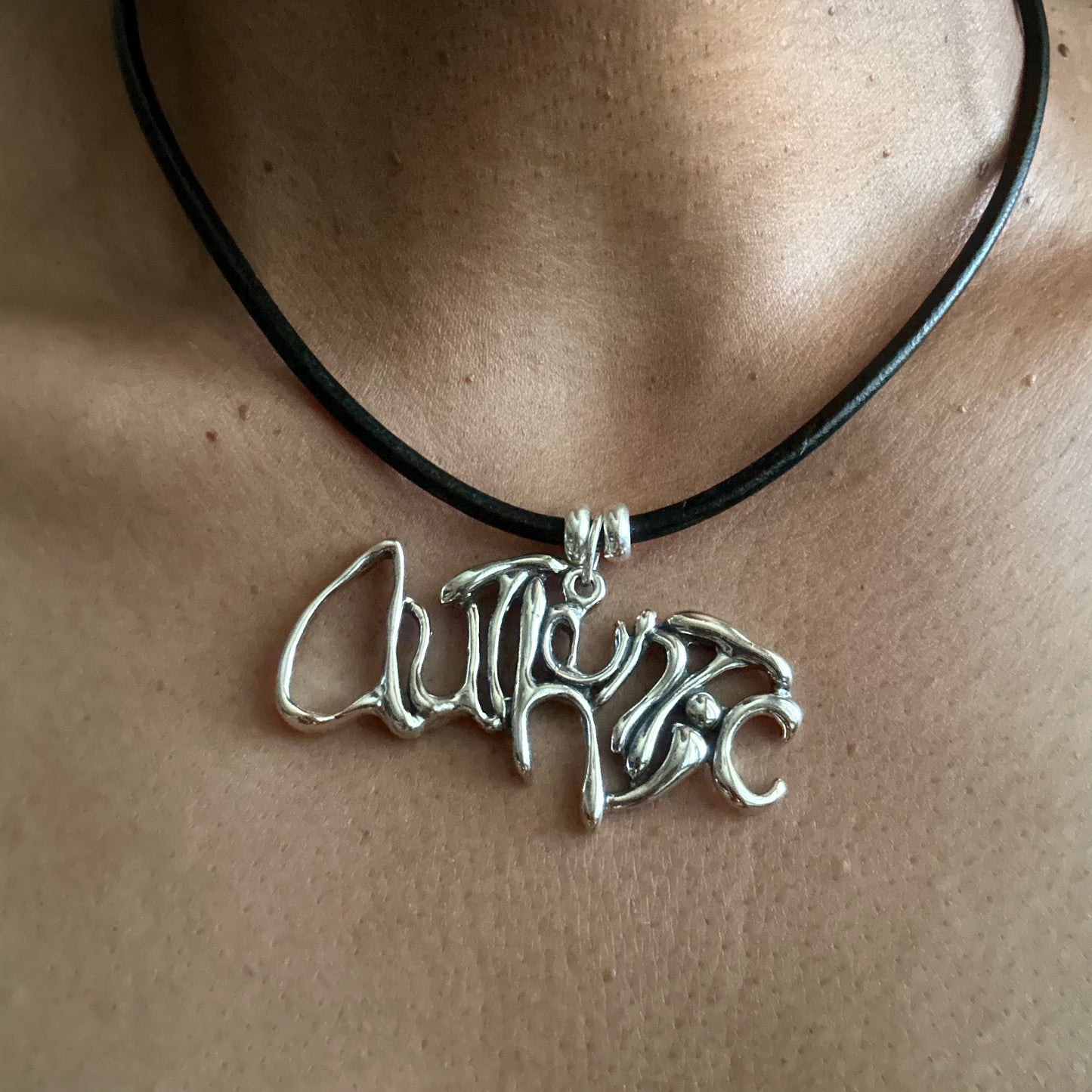 Word Art Jewelry - Authentic, Sterling Silver with leather necklace.