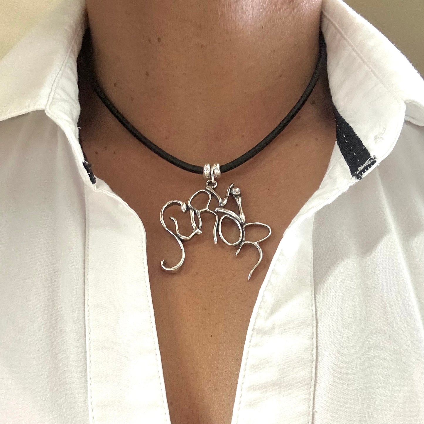 Survivor- Sterling Silver with Leather