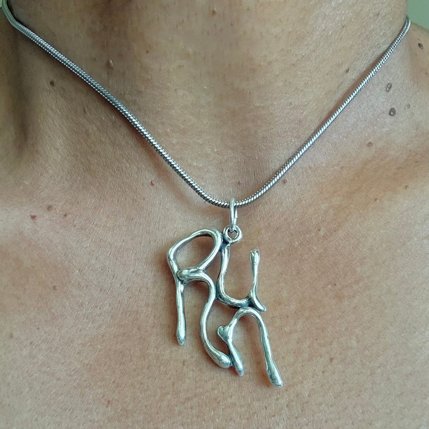 Run- Sterling Silver with Leather Necklace